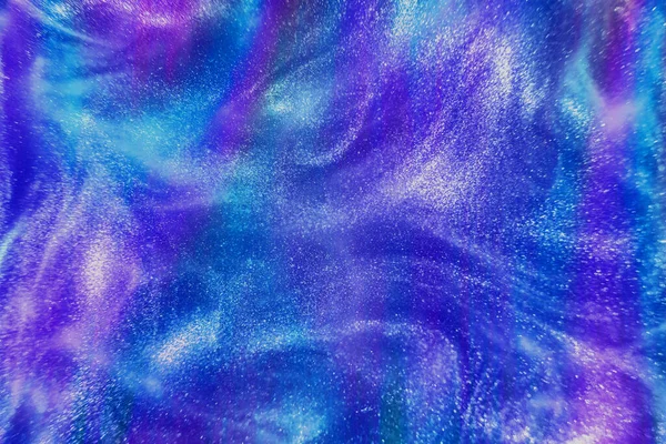 Abstract Neon Rainbow Colored Glitter Particles Flow Shallow Depth Field — Fotografia de Stock