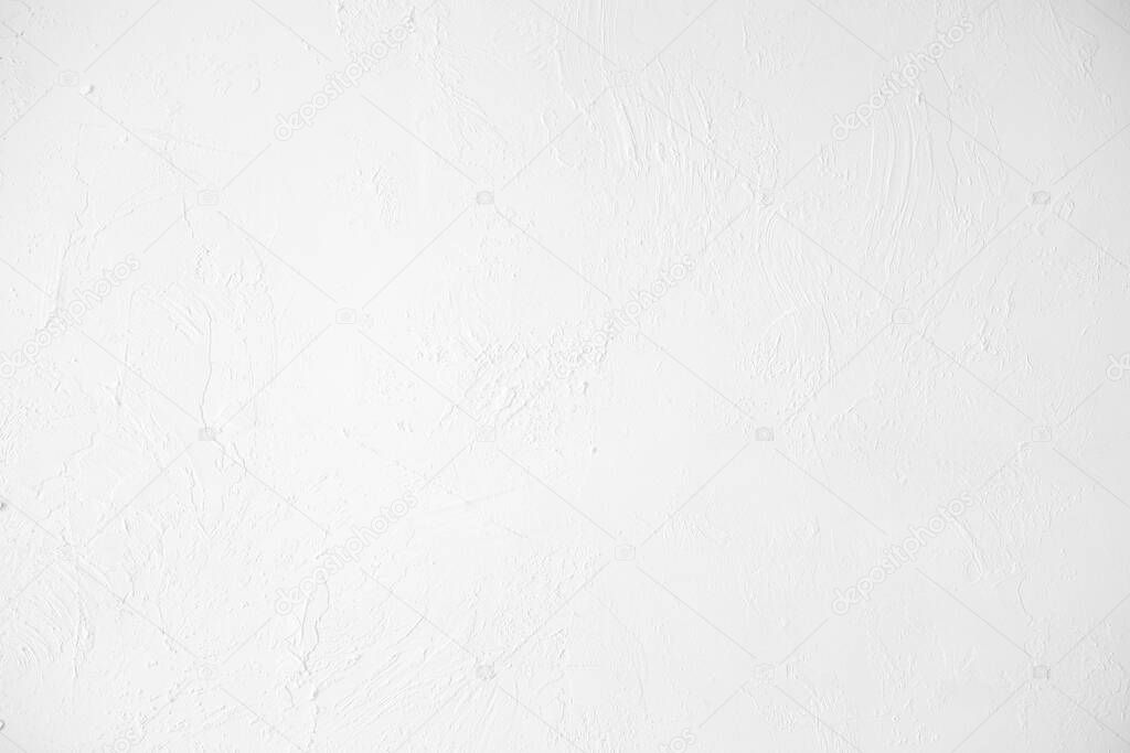 Neutral white colored low contrast Concrete textured background with roughness and irregularities to your concept or product.