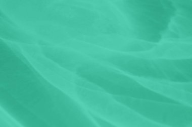 Işık ve gölgeli yakıcı efektli naneli, soyut arkaplan. Işık camdan geçer. 2020 yıllık renk eğilimi