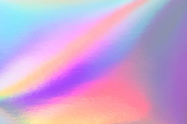 80 'lerin tarzında soyut gökkuşağı holografik arka planı. Mor, pembe ve parlak neon renkli bulanık doku.