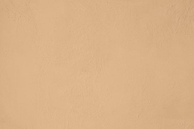 Soluk bej renkli, düşük kontrastlı Beton pürüzlü ve düzensiz bir arka plan. 2020, 2021 Renk Eğilimi.