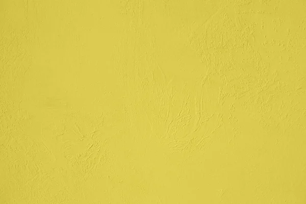 彩度の高い黄色の低コントラスト粗さと凹凸のある具体的なテクスチャの背景 2020年 2021年カラートレンド — ストック写真