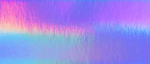 Blurred abstract trendy rainbow holographic banner background in 80s style. Blurred texture in violet, pink and mint bright neon colors.