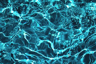 Koyu yeşil zümrüt renginde kabarcıklar ve sıçramalarla kaplı sert su yüzeyi dokusu. Yeni moda soyut doğa geçmişi.