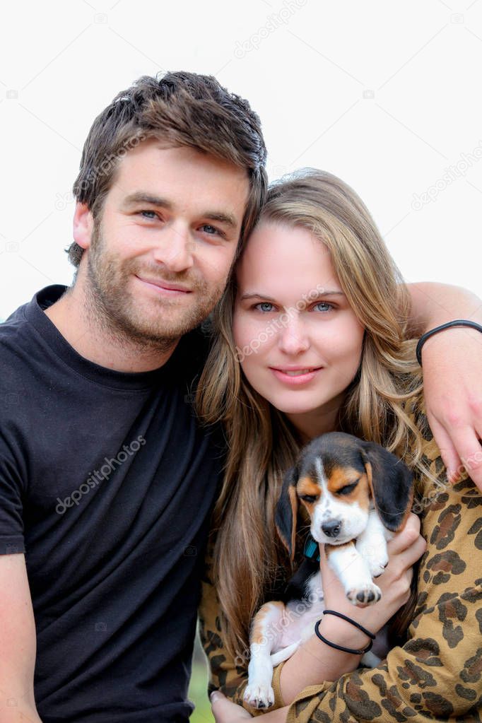 attractive couple with family pet dog