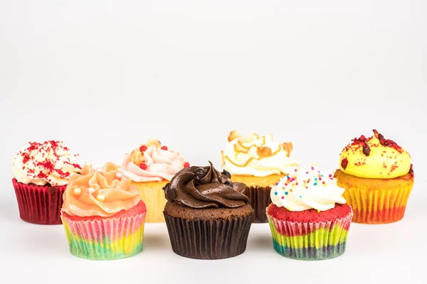 Cupcakes on a white background. — Stock Photo, Image