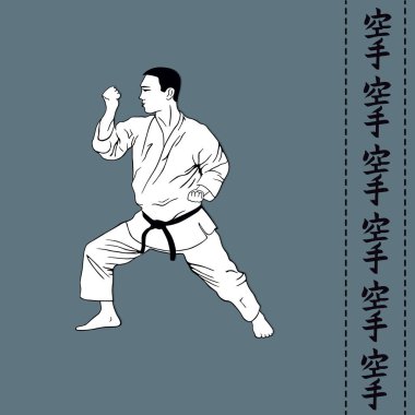 Resimde, adam karate gösterir..
