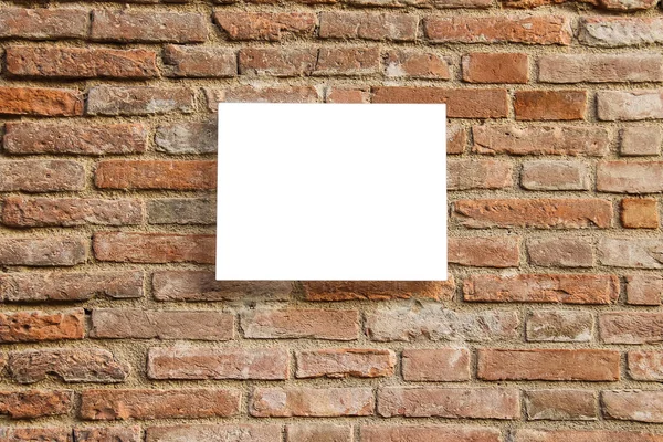 Empty information sign on old brick wall. White color — Stock Photo, Image