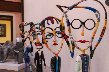 Figures of The Beatles by sculptor Dorit Levinstein in art galle clipart