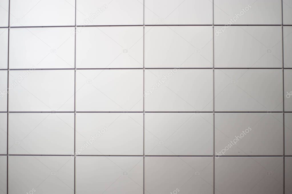 Wall panels of gray tile. 