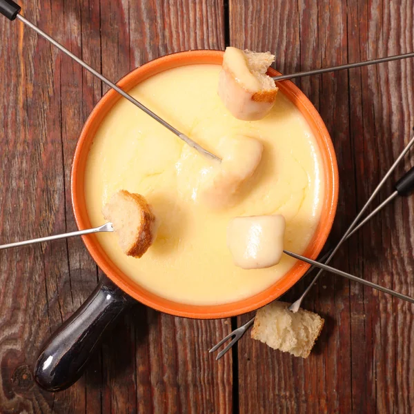 Swiss cheese fondue Stock Photos, Royalty Free Swiss cheese fondue Images Depositphotos