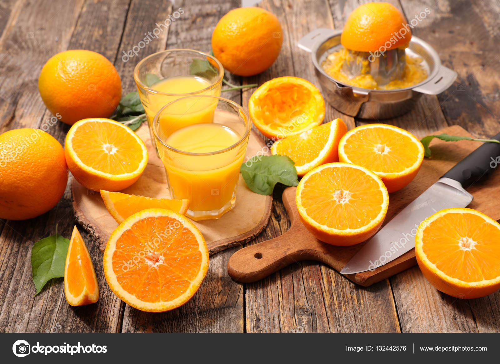 Fresh oranges and juice Stock Photo by ©studioM 132442576