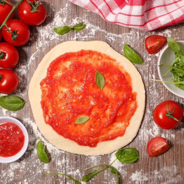 Pizza with tomato sauce — Stock Photo, Image