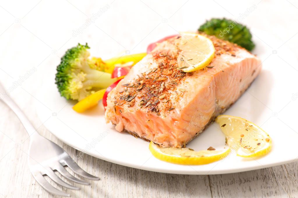 salmon fillet with salad