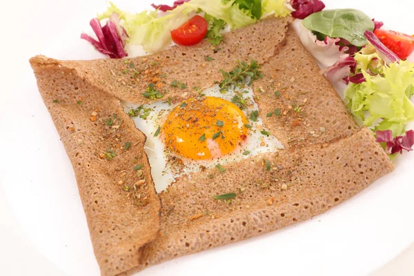 Buckwheat crepe with egg and cheese — Stock Photo, Image