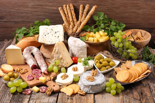 Cheese and salami assortment — Stock Photo, Image