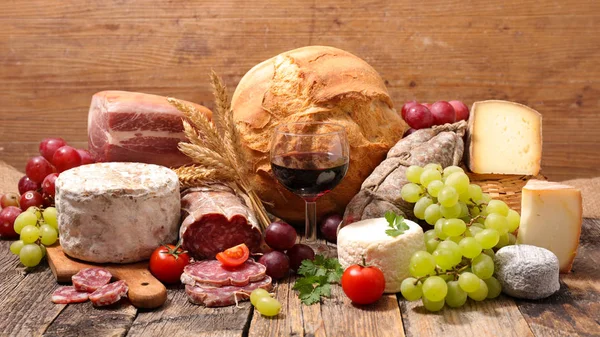 Cheese, meats and wine — Stock Photo, Image