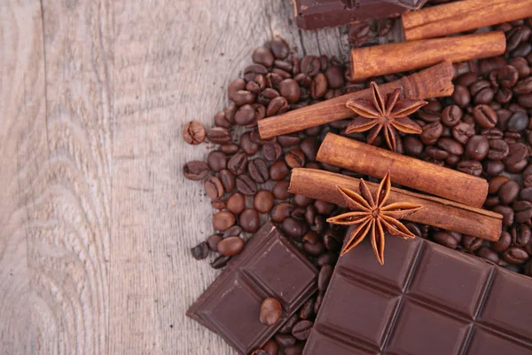 Chocolate, coffee beans and spices — Stock Photo, Image