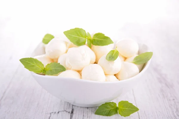 Mozzarella and basil leaves — Stock Photo, Image