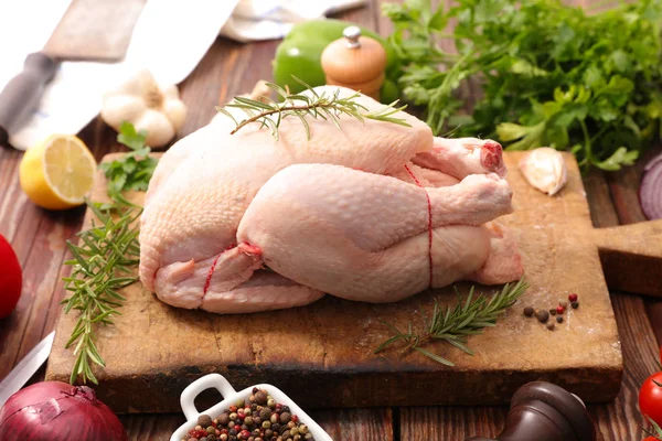 Raw chicken with ingredients — Stock Photo, Image