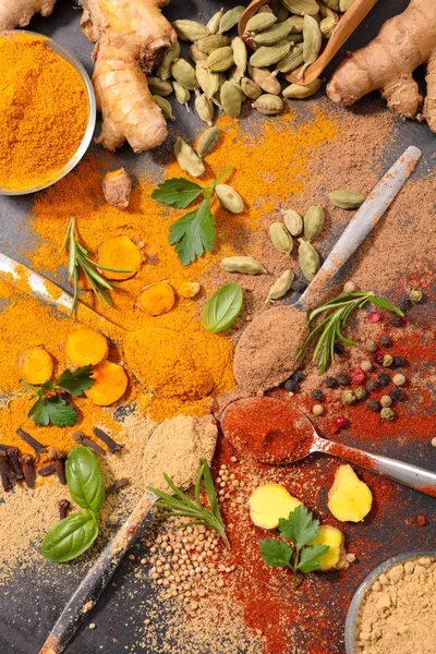 Assorted herbs and spices on table — Stock Photo, Image