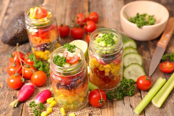 Vegetable salad in jars — Stock Photo, Image