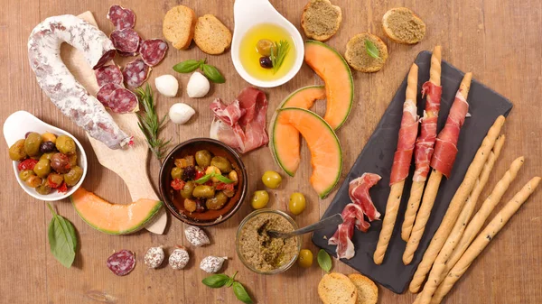 Antipasti with melon and ham — Stock Photo, Image