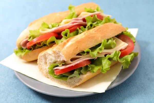 Delicious sandwiches with lettuce — Stock Photo, Image