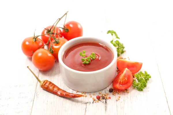 Sauce with cherry tomatoes bunch — Stock Photo, Image