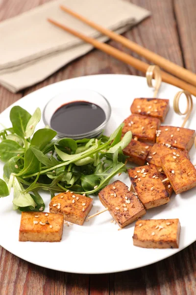 Fried tofu with salad and soy sauce — Stock Photo, Image