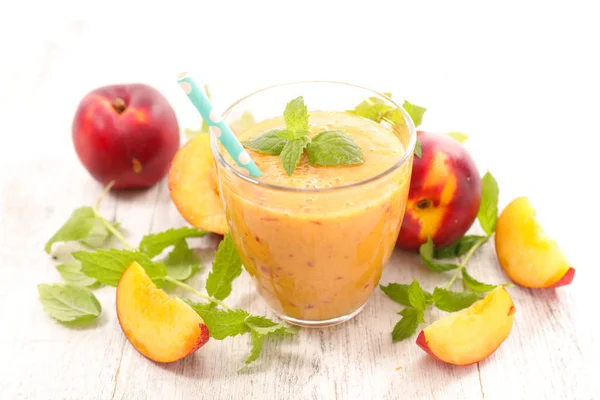 Peach smoothie on table — Stock Photo, Image