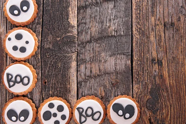 Απόκριες cookies σε ξύλινα φόντο — Φωτογραφία Αρχείου