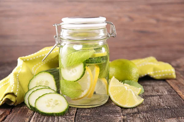 Water with cucumbers and lemons — Stock Photo, Image