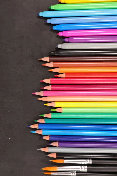 Colorful pencils on dark — Stock Photo, Image