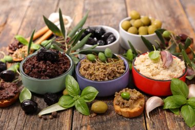 Bowls of olive tapenade clipart