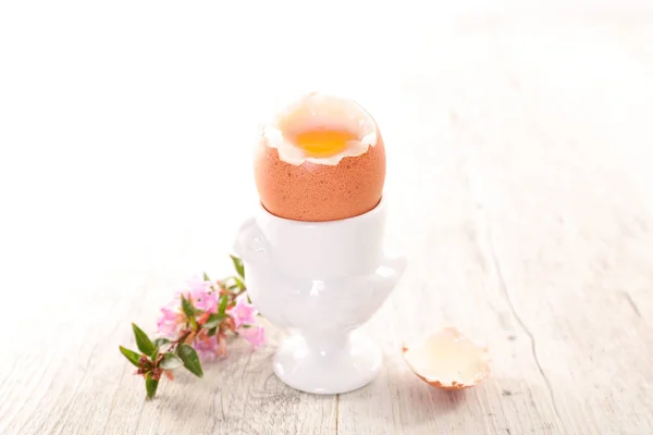 Boiled egg and flower — Stock Photo, Image