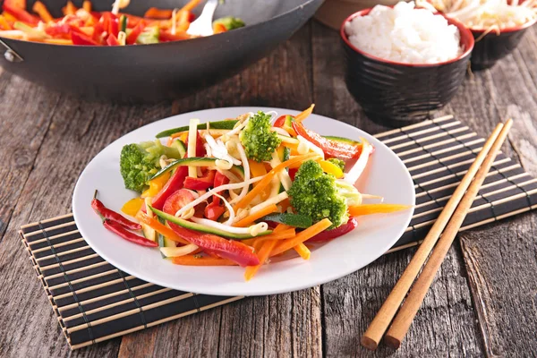 Fried vegetables with chopsticks — Stock Photo, Image