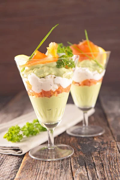 Avocado cream with smoked salmon — Stock Photo, Image