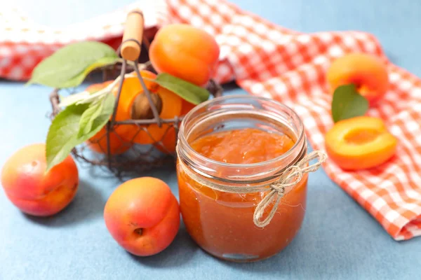 Jar with fruit jam on table — Stock Photo, Image