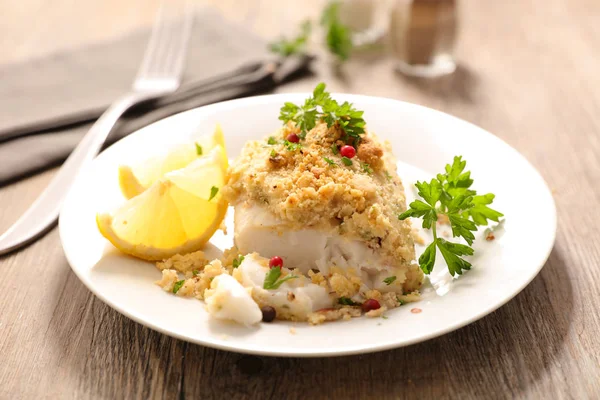 Baked fish on plate — Stock Photo, Image