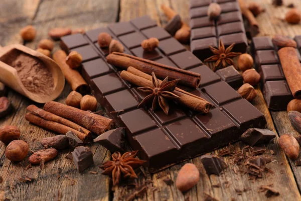 Assorted chocolate and spices — Stock Photo, Image