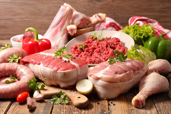 Assorted Variety Meat Wooden Table — Stock Photo, Image