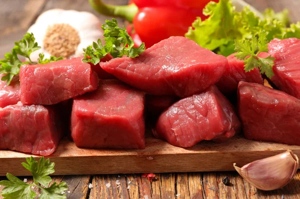 Raw beef on table — Stock Photo, Image