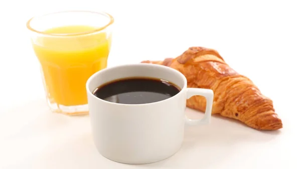 Tasse, jus d'orange et croissant — Photo