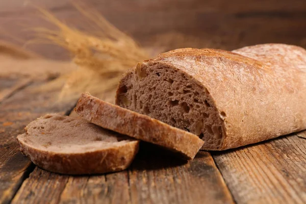 Homemade bread and wheat — Stock Photo, Image