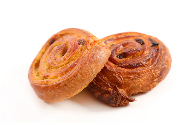 french pastry with raisins on white