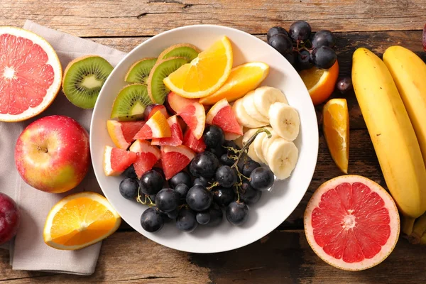 Skål Med Frukter Träbord Ovanifrån — Stockfoto