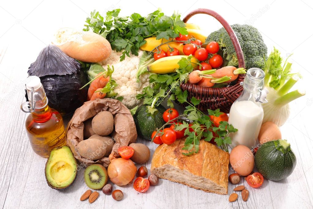 fruits, vegetablse and dairy on wooden  table