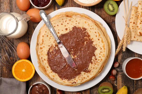 Närbild Pannkakor Med Choklad Och Frukt Träbord — Stockfoto