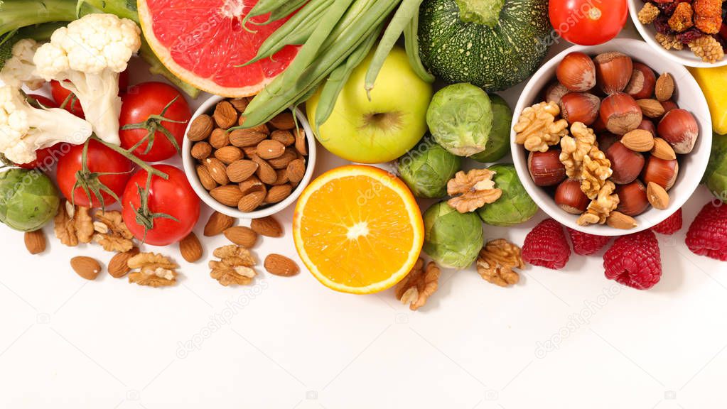 Close-up view of assorted health food on white background